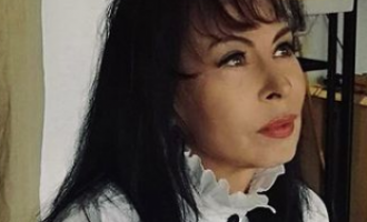 Изможденную и с косынкой на голове Марину Хлебникову засняли в больнице